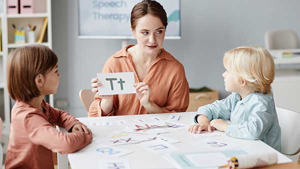 english-teacher-with-children-at-school-2021-12-09-20-03-41-utcz.jpg